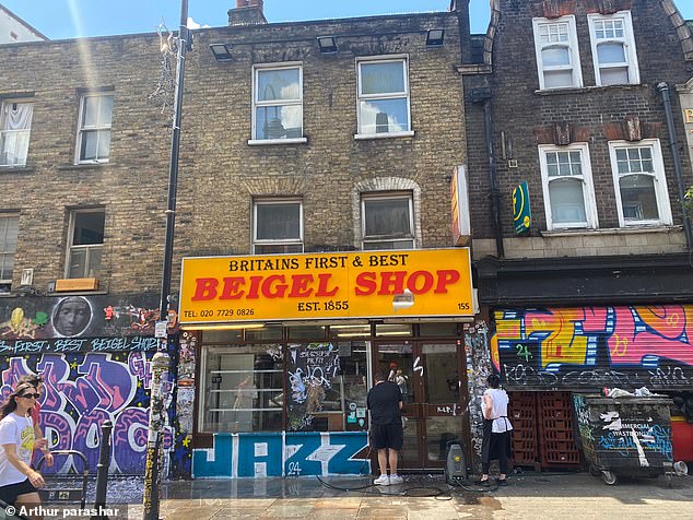 One of the iconic Beigel shops has text written underneath is which reads 'Jazz'. It comes as even historical landmarks have not escaped the vandalism