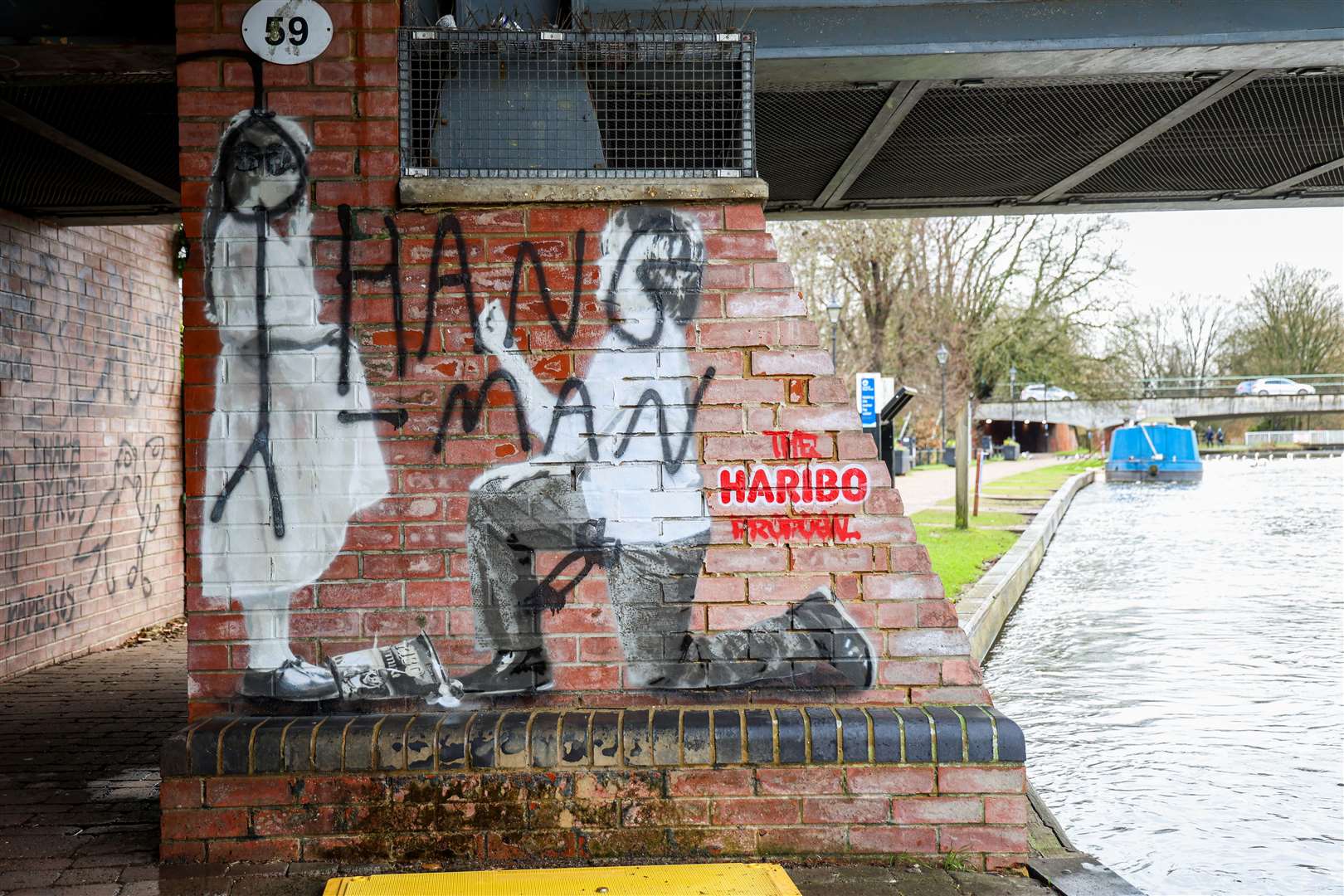 The popular Newbury town centre mural was defaced with several offensive phrases over the weekend