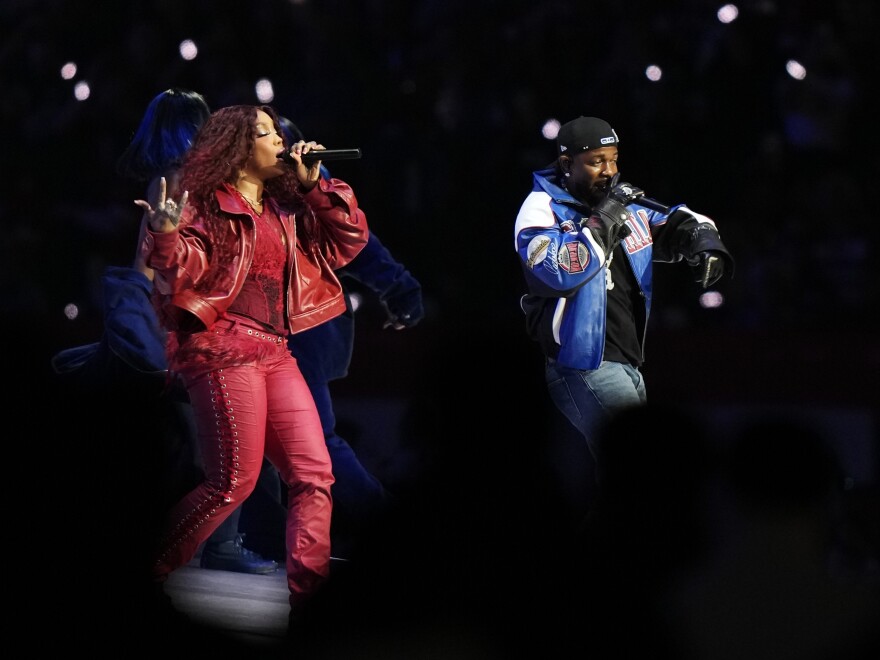 SZA, left, and Kendrick Lamar onstage during Lamar's halftime performance.