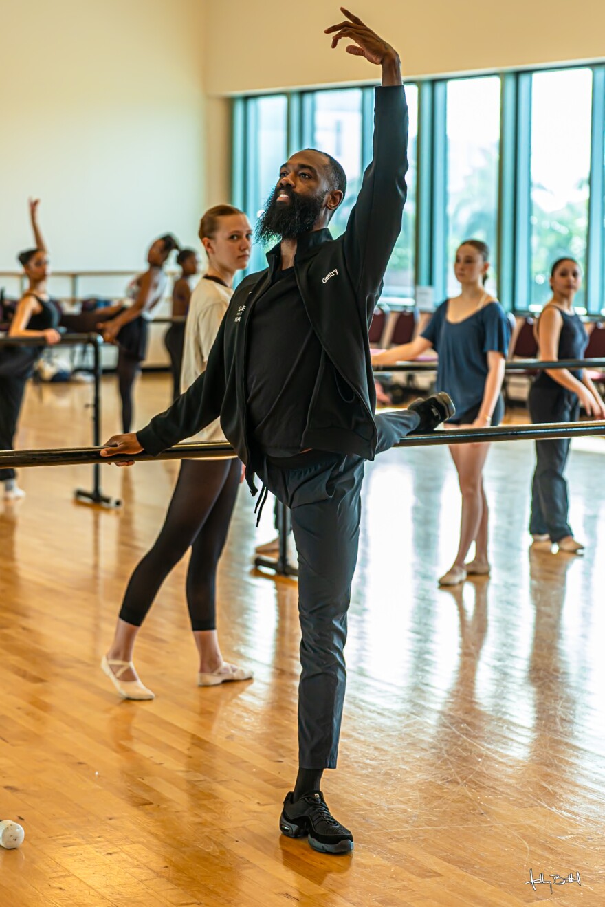 Gentry George, one of MOVE'S dance artist instructors teaching a class last year. He joins a guest artist and concert choreographer. | 2025