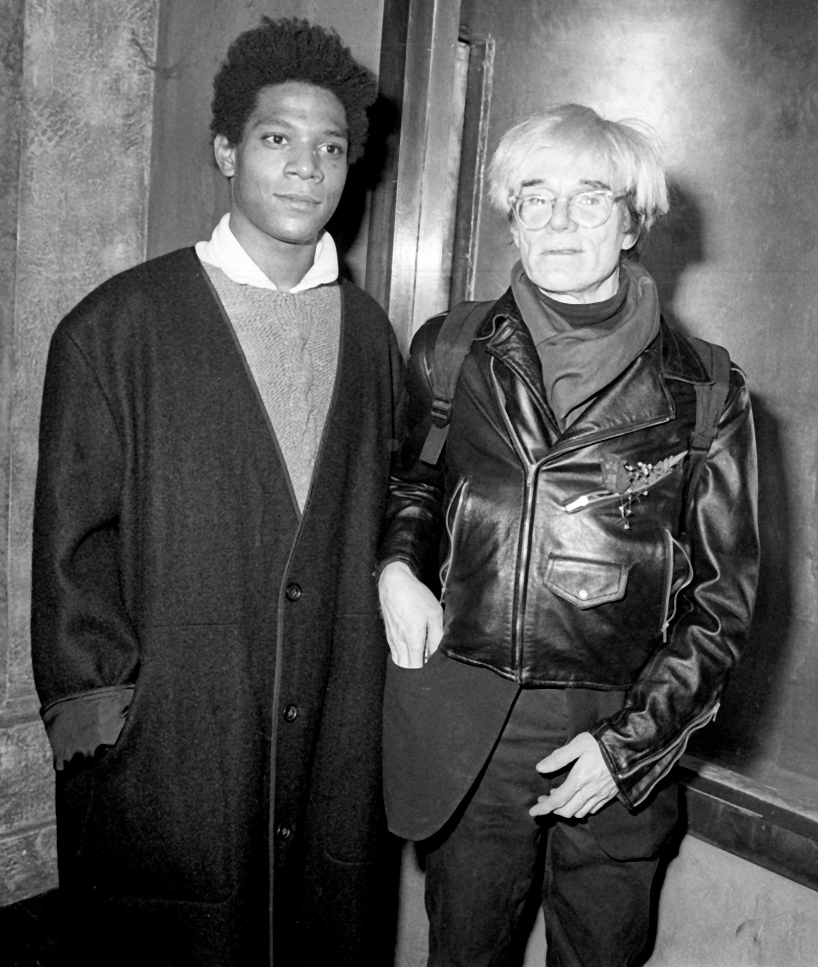 Image may contain JeanMichel Basquiat Andy Warhol Clothing Coat Jacket Adult Person Face Head and Accessories