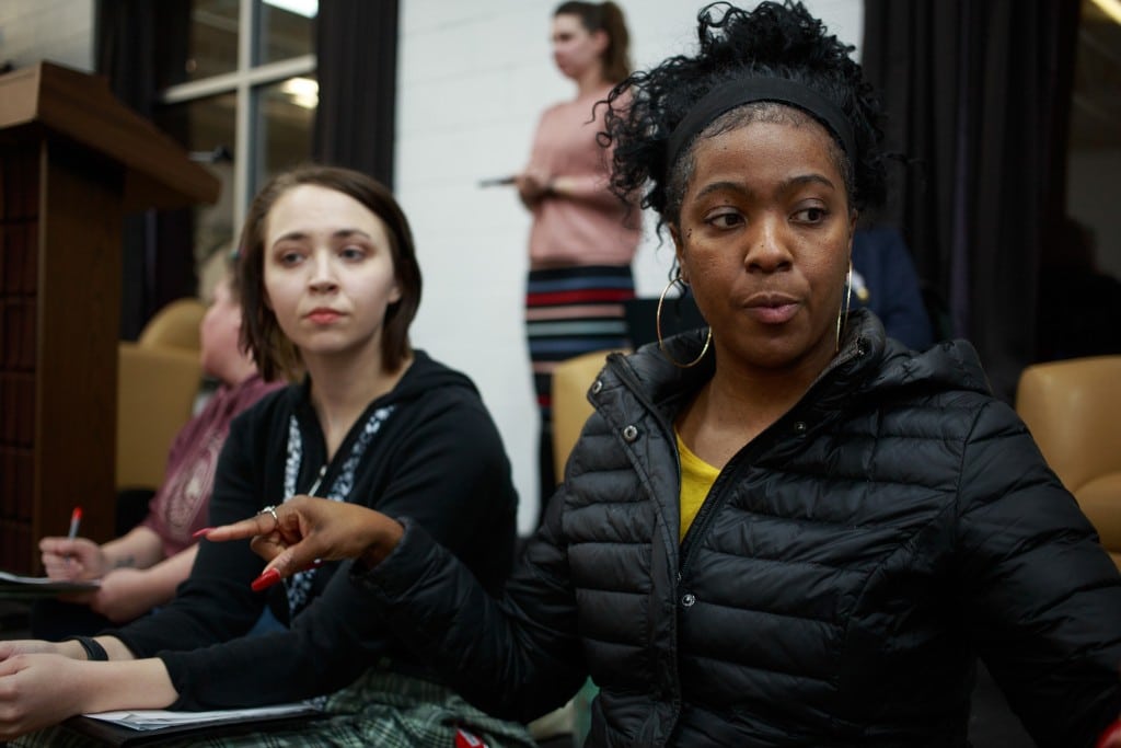 Shantese Robinson sits talking with Maegan Sargent.