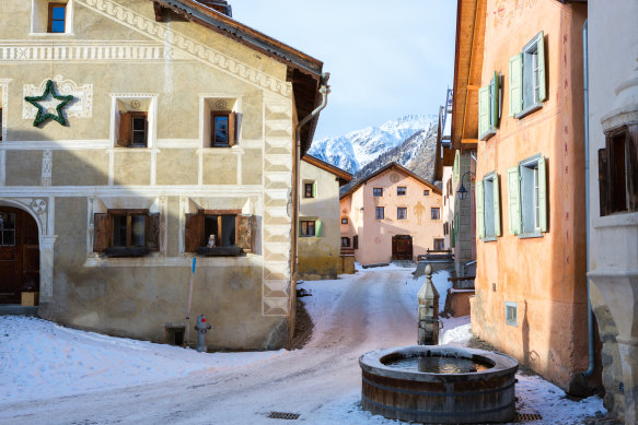 Tell-tale markings on a winding street in an older part of the Inn District, Switzerland.