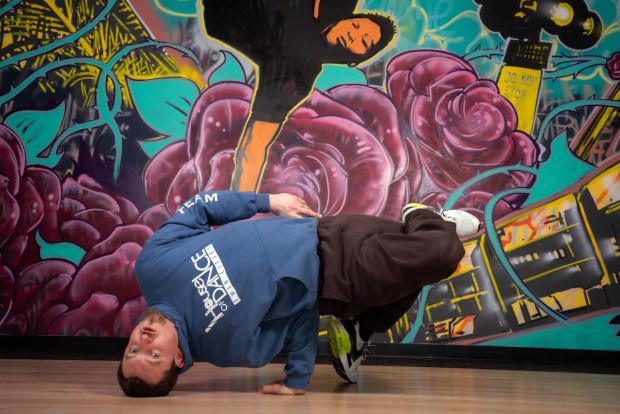A man poses in a breaking form.