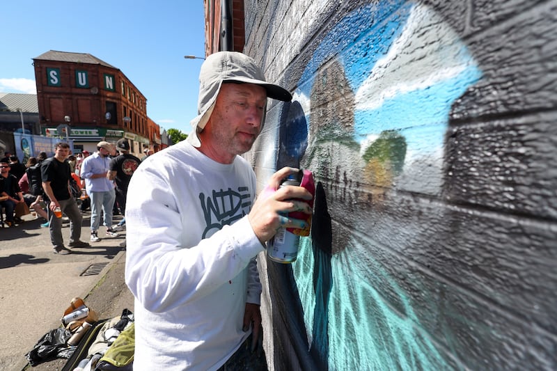 Hit the North Street Art Festival finishes off with a block party featuring 60 local and international artists painting various murals around the Kent Street area in Belfast City Centre PICTURE: MAL MCCANN