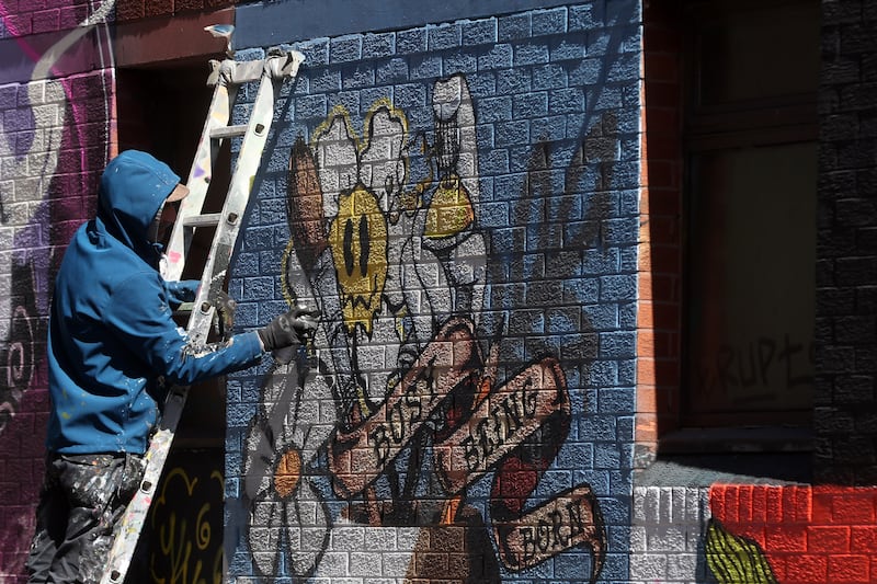 Hit the North Street Art Festival finishes off with a block party featuring 60 local and international artists painting various murals around the Kent Street area in Belfast City Centre PICTURE: MAL MCCANN