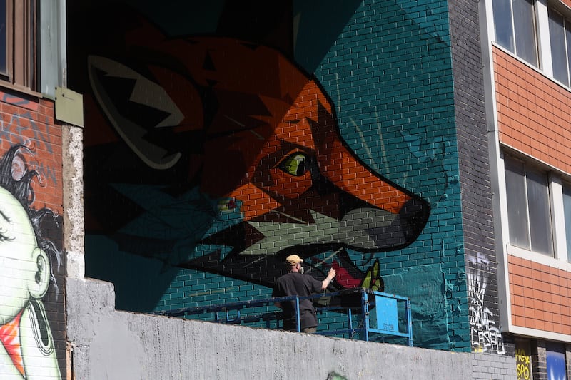 Hit the North Street Art Festival finishes off with a block party featuring 60 local and international artists painting various murals around the Kent Street area in Belfast City Centre PICTURE: MAL MCCANN