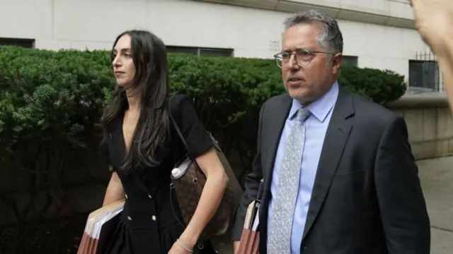 Sean Combs' attorneys Teny Geragos (left) and Marc Agnifilo walk down the street.