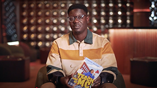 Edmund Adjapong and his new book.