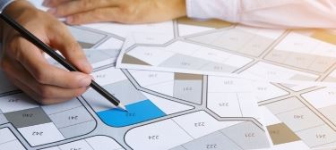 a planner working on plats